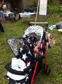 Cosatto Shuffle with child on board